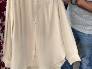 ✨ Luxe & Chic: Cream Satin-Effect Shirt with Rhinestone Buttons Paired with Trousers ✨