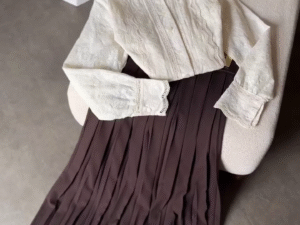 🤍 Elegant Contrast: White Lace Shirt with Brown Pleated Skirt