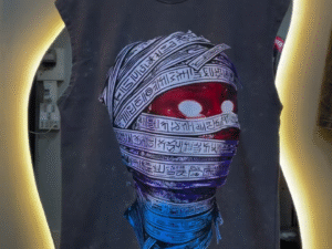 Urban Edge Statement: Graphic Sleeveless Tee with Futuristic Mummy Design