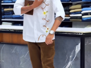 Artistic Casual Flair: Statement White Shirt with Earth-Tone Trousers