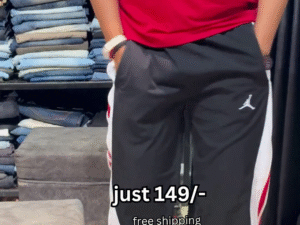 Sporty Street Vibes: Bold Red Tee with Contrast Track Pants